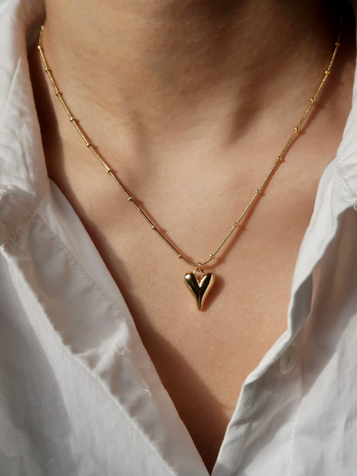 gold tone heart pendant necklace