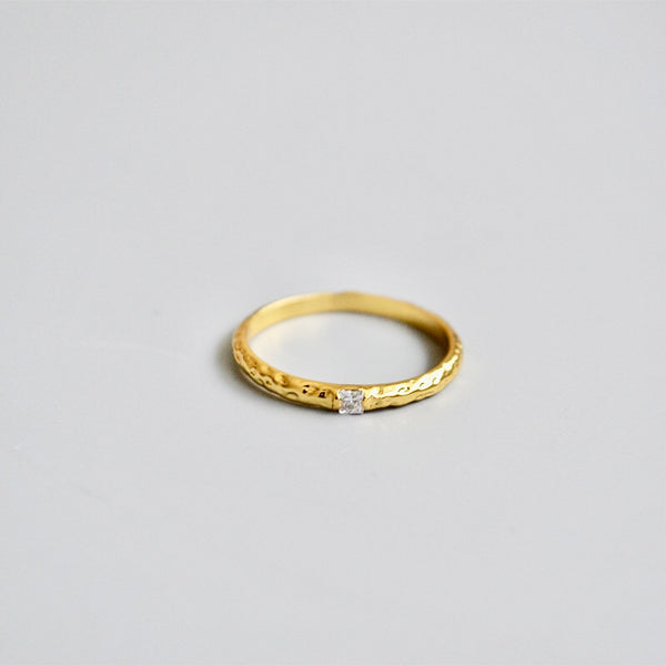 single zirconia gold tone ring in Hammered