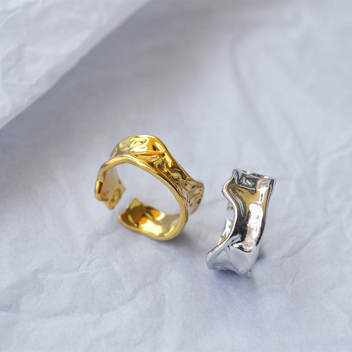 Irregular wavy open ring in gold tone