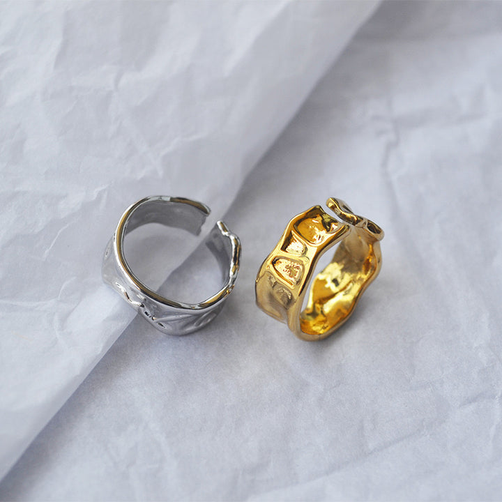 Irregular wavy open ring in gold tone